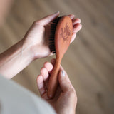 Pocket brush with natural boar bristles